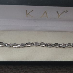 Kay Elegant Silver and Black Infinity Bracelet
